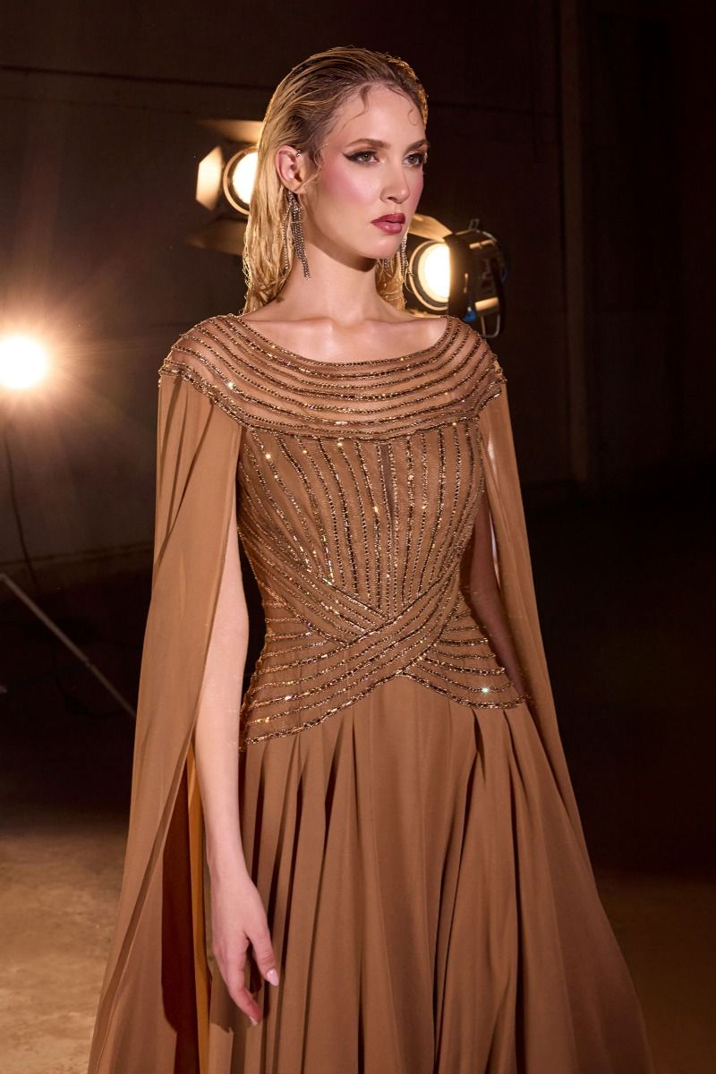 Bateau neckline w/ beaded bodice and dramatic cape sleeves