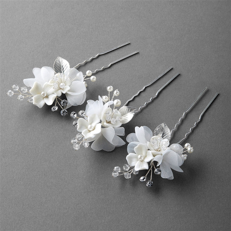 Bridal Hair Stick Pins with Ivory Resin Flowers and Pearls - Set of Three Hair Sticks   Additional Photos:     Bridal Hair Sticks with Ivory Resin Flowers, Ivory Pearls and Fabric Leaves - Set of 3 Hair Sticks