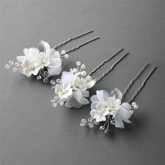 Bridal Hair Stick Pins with Ivory Resin Flowers and Pearls - Set of Three Hair Sticks   Additional Photos:     Bridal Hair Sticks with Ivory Resin Flowers, Ivory Pearls and Fabric Leaves - Set of 3 Hair Sticks
